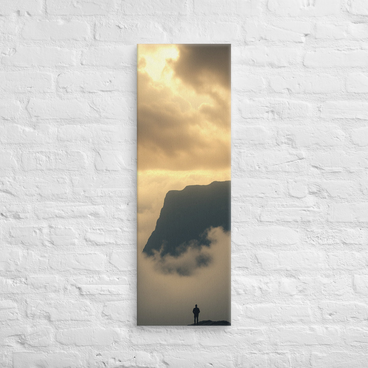Above the Golden Mist, tall wrapped canvas print: a solitary figure on a peak above glowing golden clouds, a dark mountain mass behind.