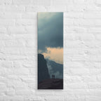 The Evening Overlook, tall wrapped canvas print: two figures on a clifftop at dusk, warm light glowing along the horizon beneath clouds.