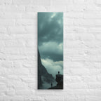 On Separate Ledges, tall wrapped canvas print: two figures standing apart on separate rocky pinnacles amid streaming clouds.
