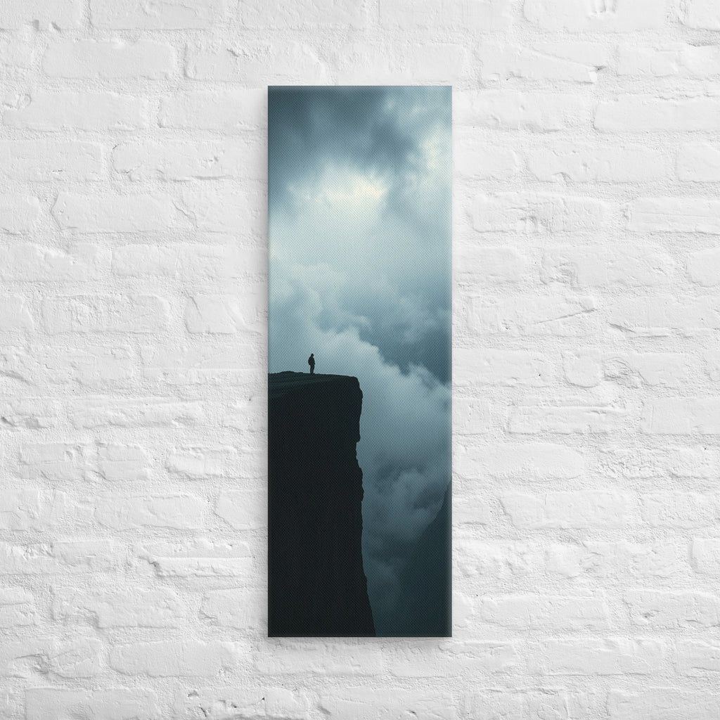 At the Cloudline, tall wrapped canvas print: a lone figure at a cliff edge with storm clouds boiling below and dark sky above.