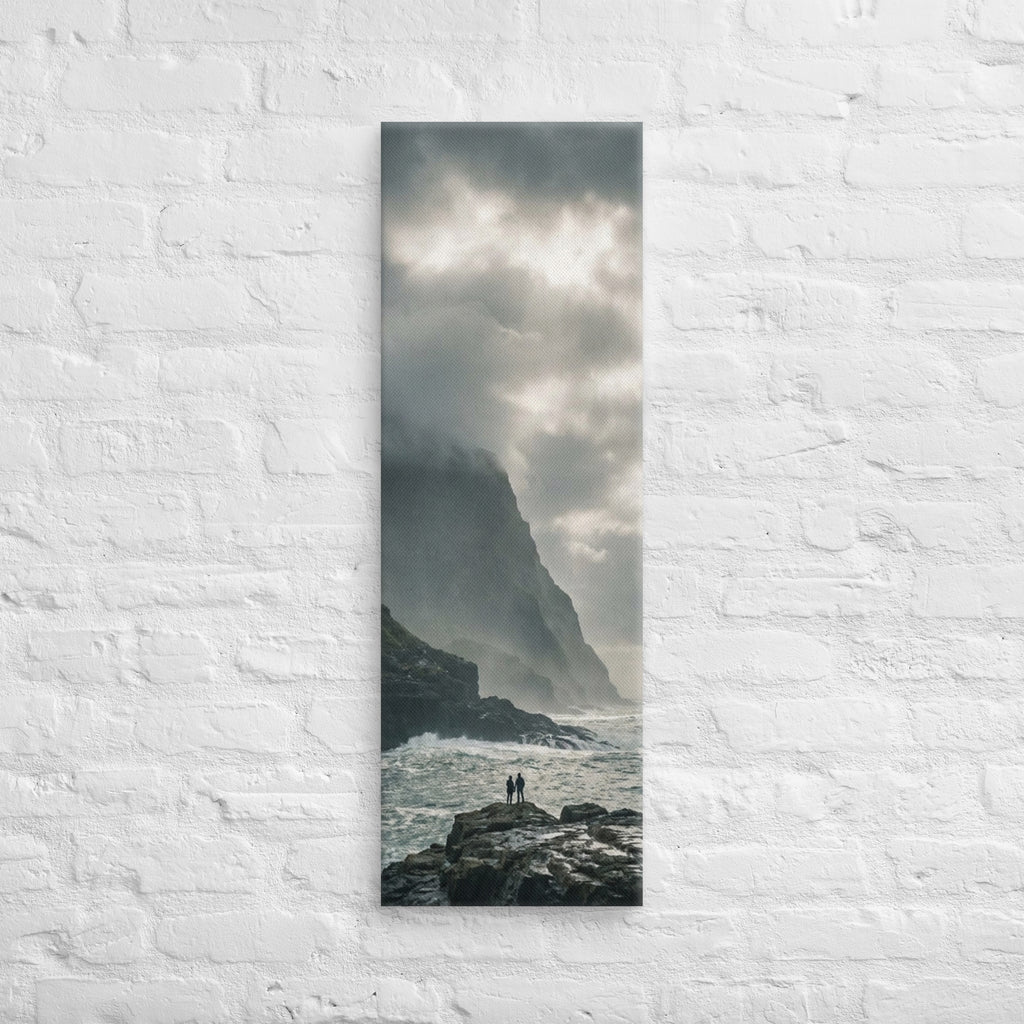Where the Cliffs Meet the Sea, tall wrapped canvas print: two figures on wave-washed rocks where tall cliffs meet a churning sea.