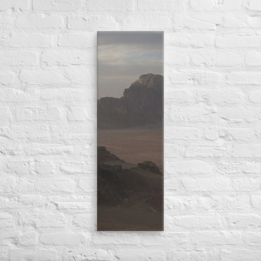 The Desert Stillness, tall wrapped canvas print: three figures in a vast hazy desert with a lone mesa in the distance.