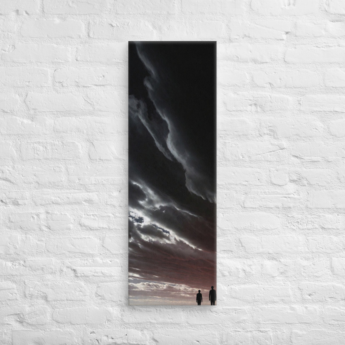 Beneath the Dark Sweep, tall wrapped canvas print: two figures on a plain beneath a vast dark sweep of cloud with a pink horizon.
