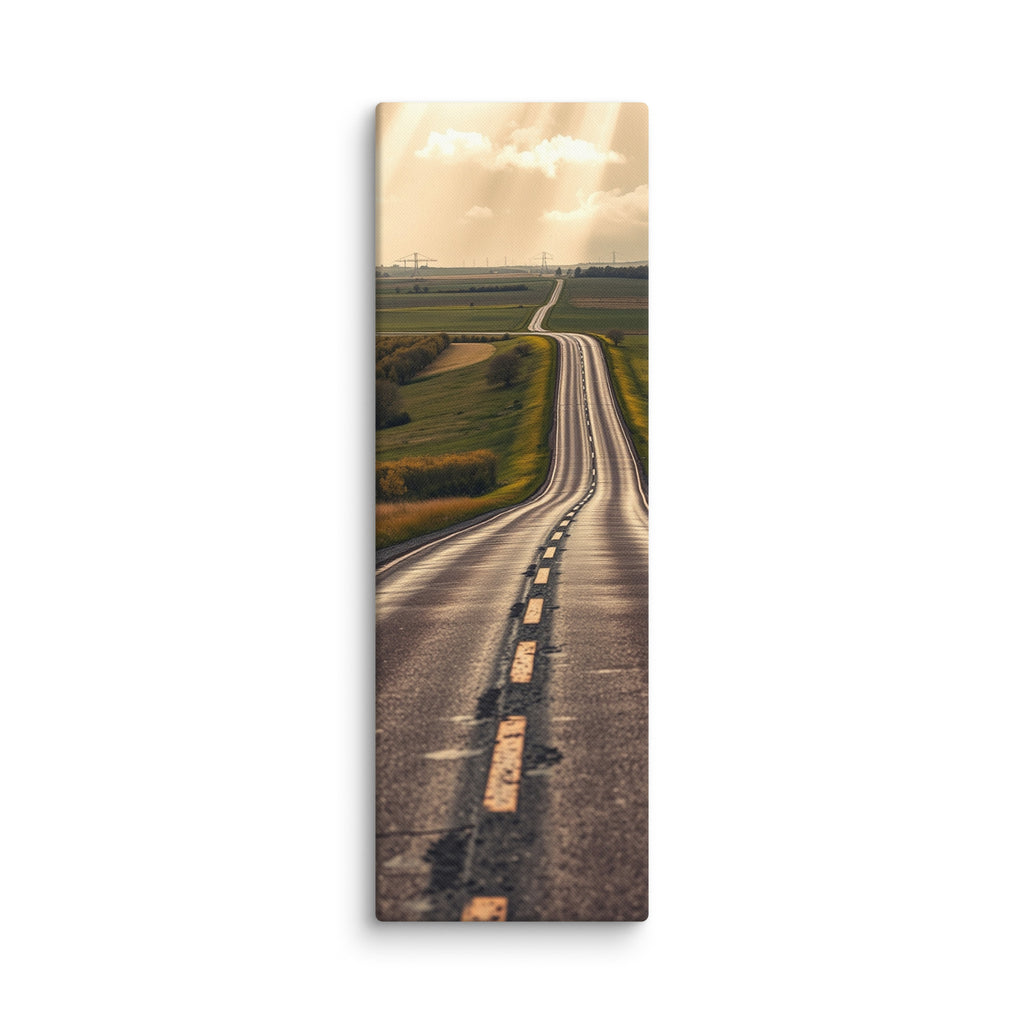 The Long Way Home, tall wrapped canvas print: a long empty road through green and gold farmland stretching to a luminous horizon under breaking sun-shafts.