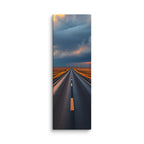 The Evening Miles, tall wrapped canvas print: a road across golden plains into a blazing sunset of towering gold and rose clouds.