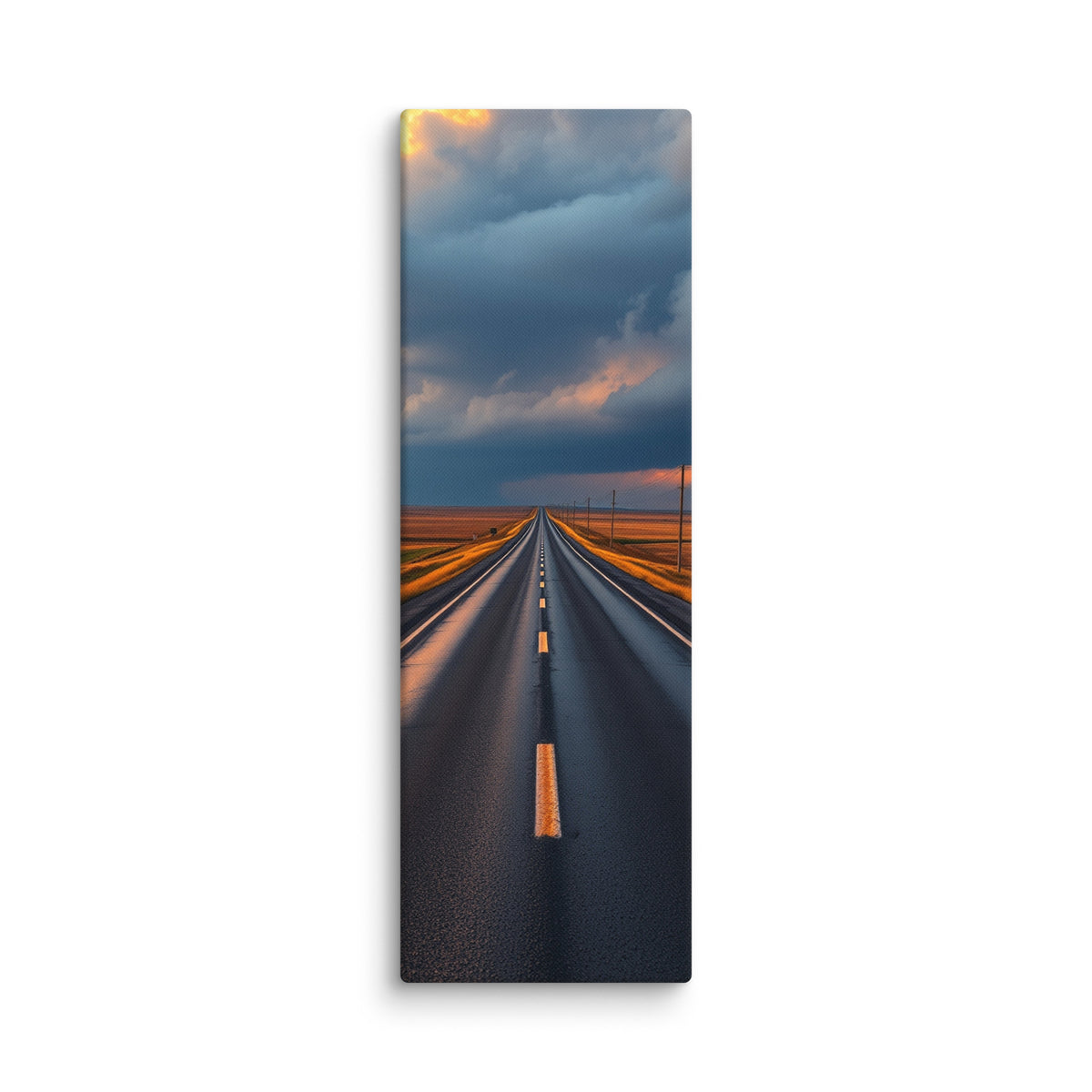 The Evening Miles, tall wrapped canvas print: a road across golden plains into a blazing sunset of towering gold and rose clouds.
