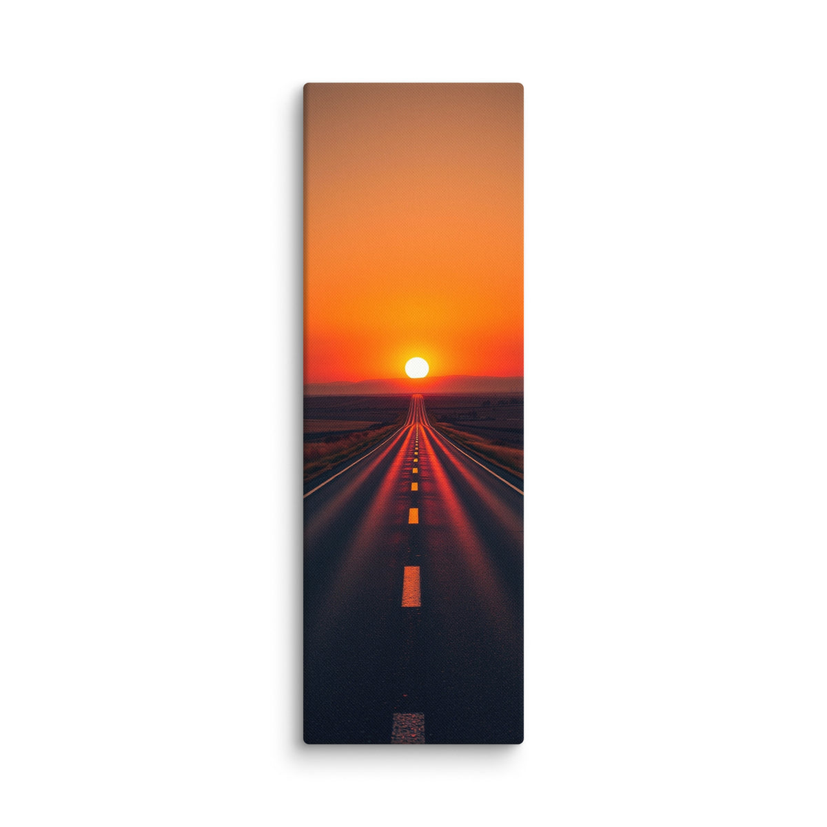 The Horizon Burns, tall wrapped canvas print: a road running straight into a blazing orange-red sunset, red light flooding the asphalt.