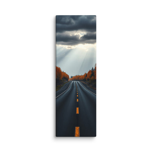 A Break In The Heavens, tall wrapped canvas print: brilliant sunbeams splitting dark storm clouds over a straight road through orange autumn forest.