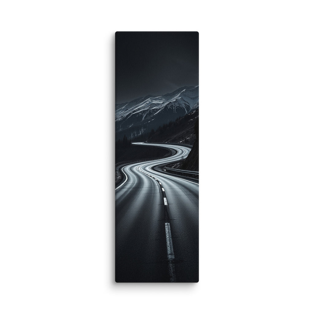 The Night Pass, tall wrapped canvas print: a dark switchback road through snowy mountains at night with distant car headlights.