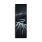The Night Pass, tall wrapped canvas print: a dark switchback road through snowy mountains at night with distant car headlights.
