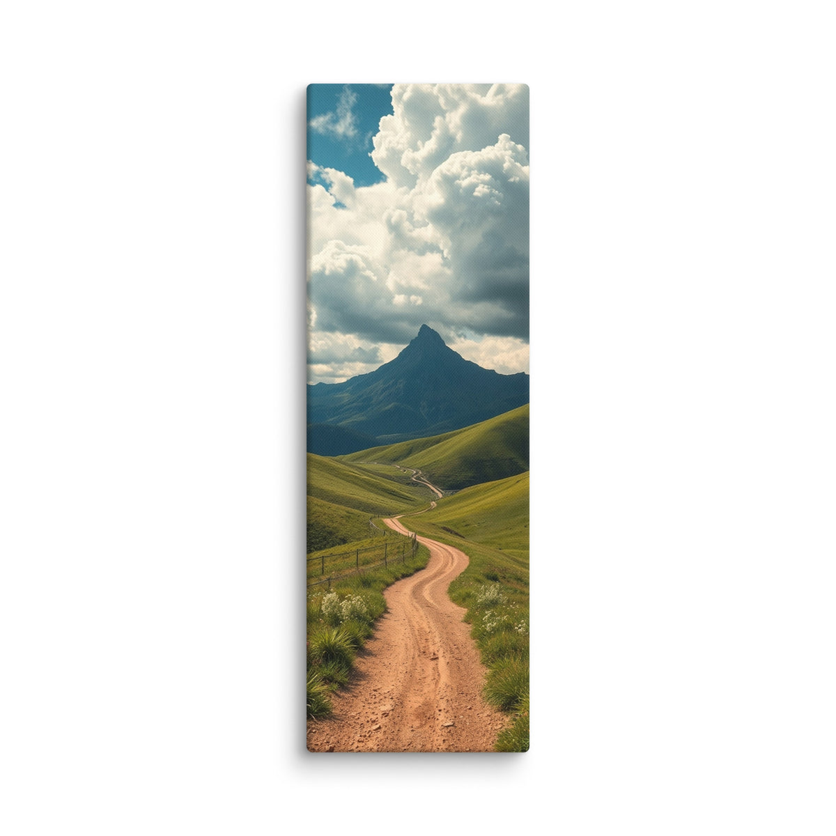 The Distant Sentinel, tall wrapped canvas print: a winding dirt road through green hills toward a sharp distant mountain peak.