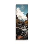 Through The Stone Gate, tall wrapped canvas print: a stream flowing between two massive rock towers toward a snow-capped mountain.