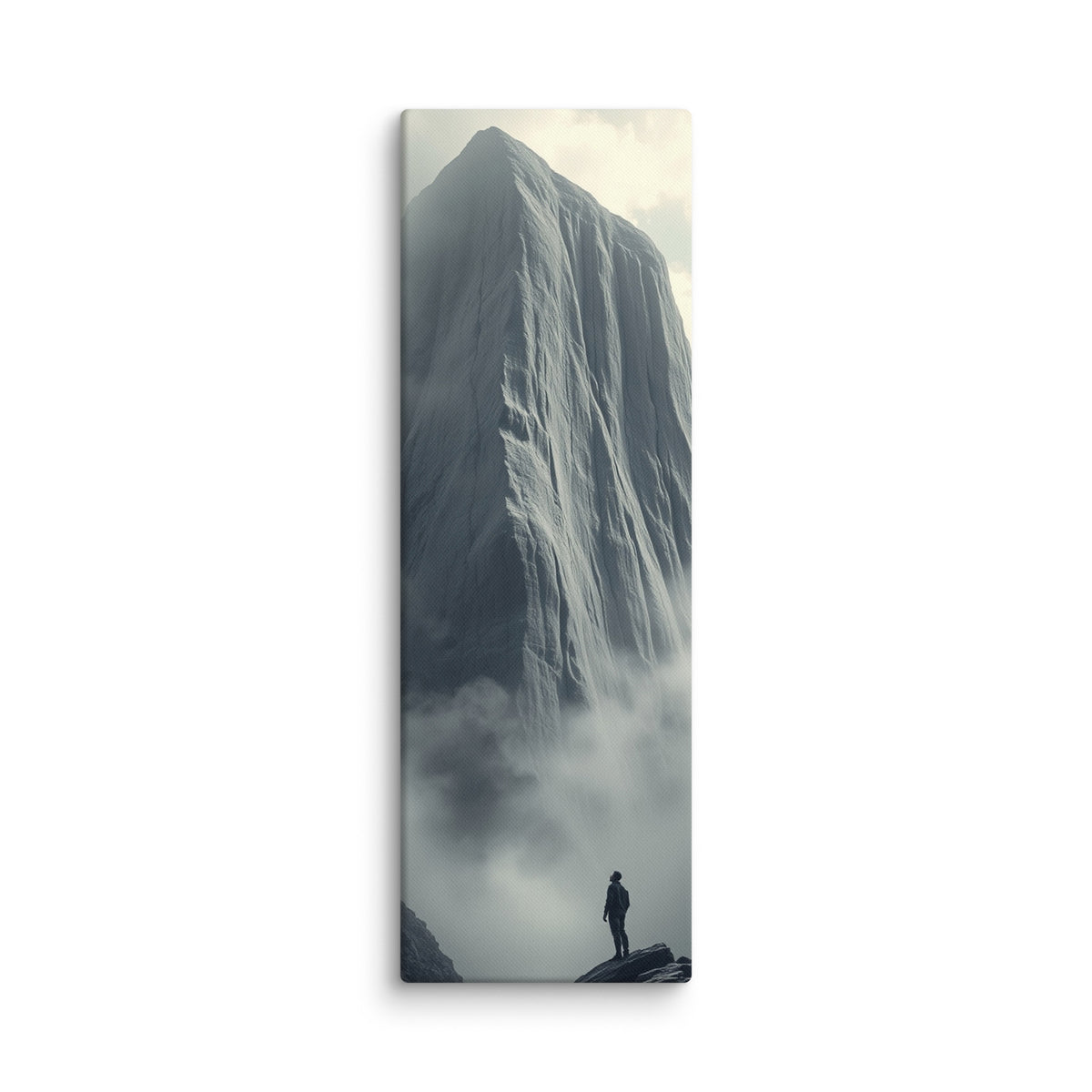 Above The Veil, tall wrapped canvas print: a lone figure on dark rocks gazing up at a massive grey ice cliff dissolving into mist.