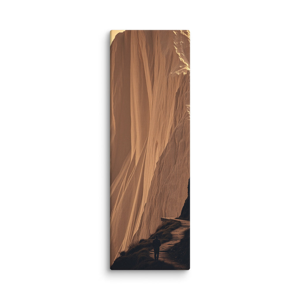 The Molten Falls, tall wrapped canvas print: a vast golden cliff face flowing like molten rock with a lone figure on the path below.