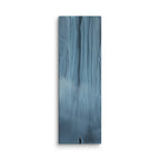 Blue Citadel, tall wrapped canvas print: a lone figure before an immense wall of pale blue ice columns rising into mist.