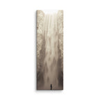 Ivory Descent, tall wrapped canvas print: a lone figure before a tall ivory-white frozen waterfall in a sepia-toned canyon.