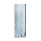 Where Forms Dissolve, tall wrapped canvas print: a lone figure in a bright white ice passage dissolving into light.