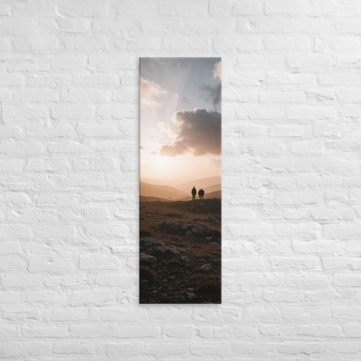 The Last Light Together, tall wrapped canvas print: two figures walking a rocky ridge at sunset, warm golden light over distant mountain peaks.