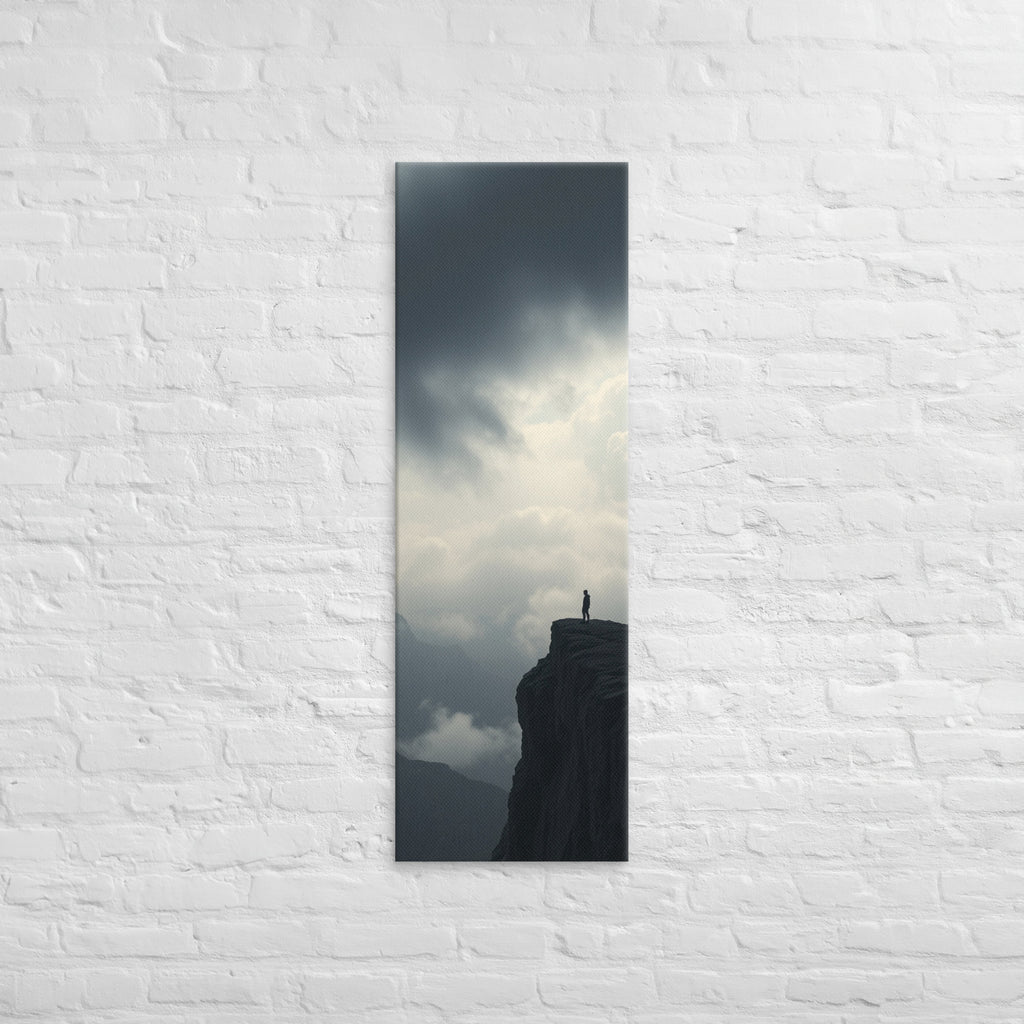 Where the Clouds Break, tall wrapped canvas print: a lone figure on a high cliff as dark clouds split open with light behind.