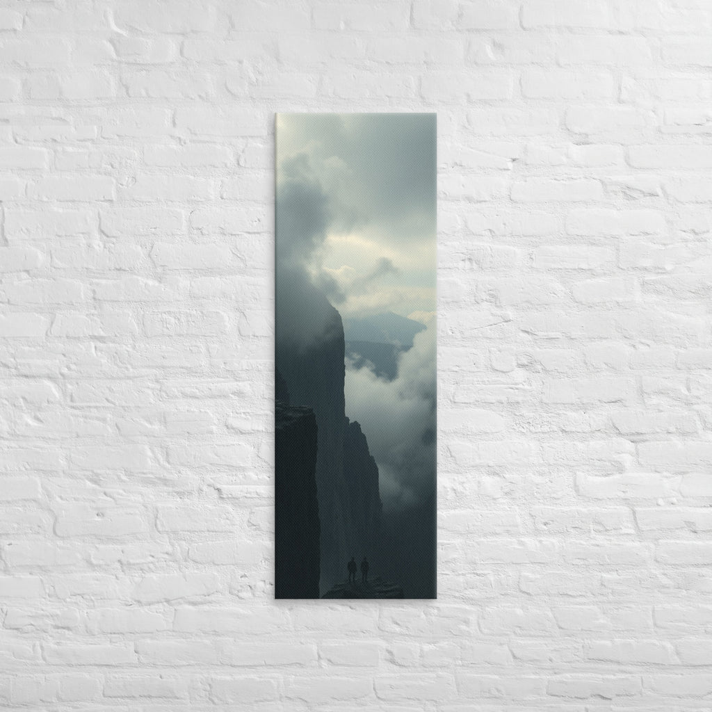 The Clouded Chasm, tall wrapped canvas print: two figures on a dark pinnacle above a chasm of churning cloud between sheer walls.