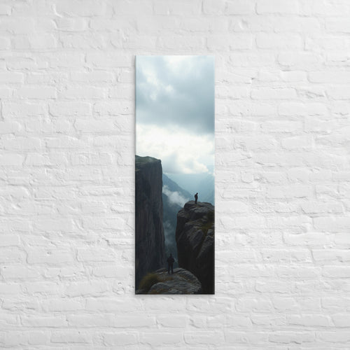 Across the Divide, tall wrapped canvas print: two figures on separate rocky outcrops with a misty mountain divide between them.