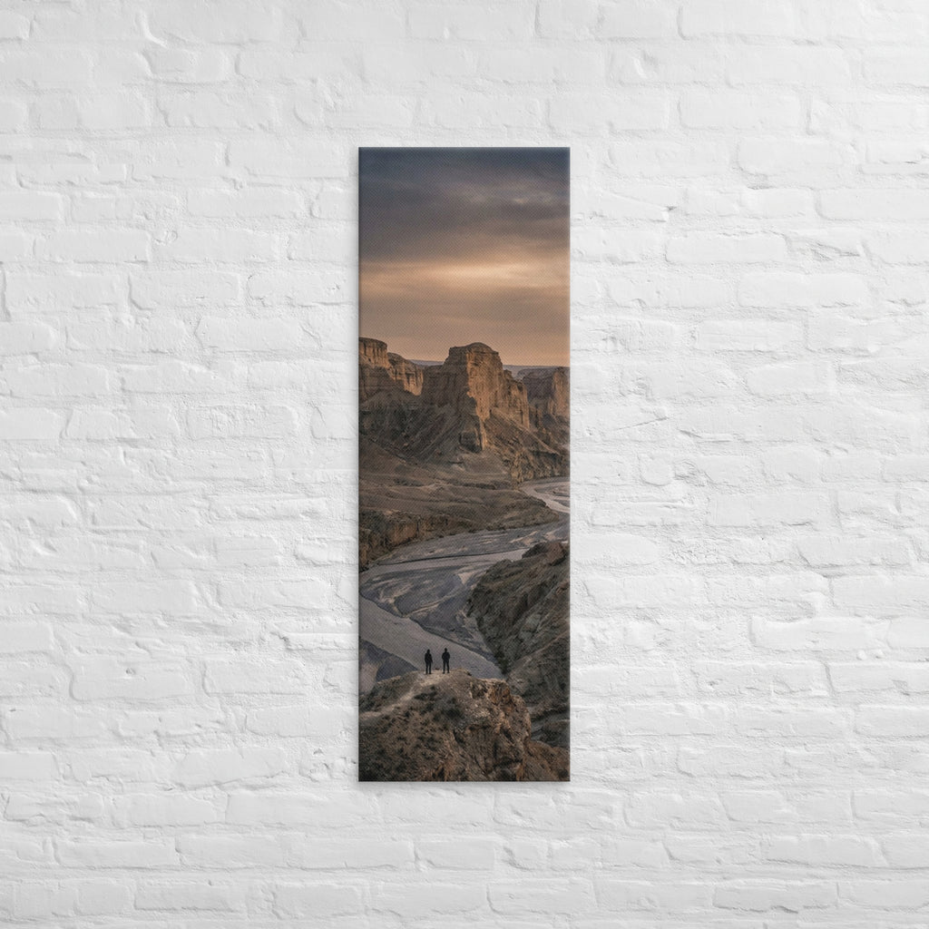 The River Beyond the Ridge, tall wrapped canvas print: three figures on a ridge above a river winding through a dusk-lit canyon.