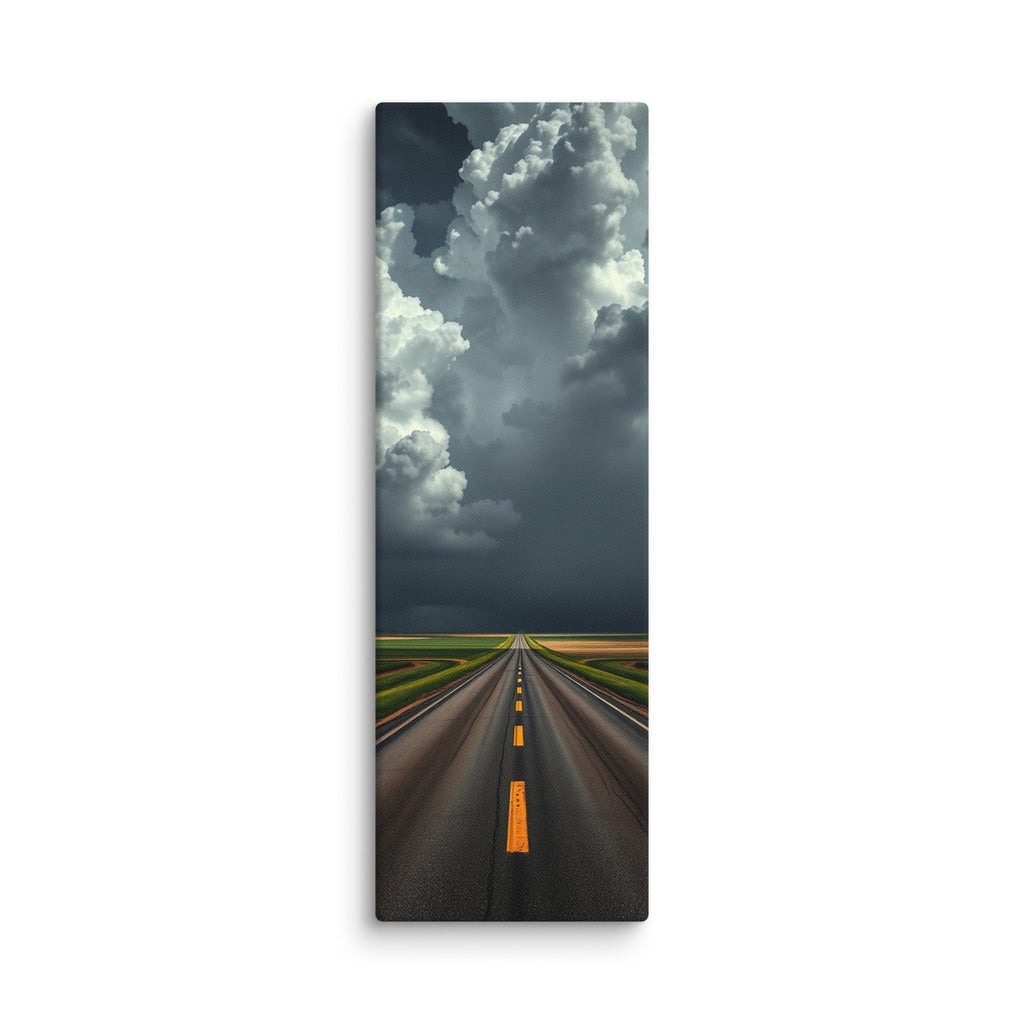 The Gathering Sky, tall wrapped canvas print: an immense white cumulus cloud building over a road through green fields, dark weather behind it.