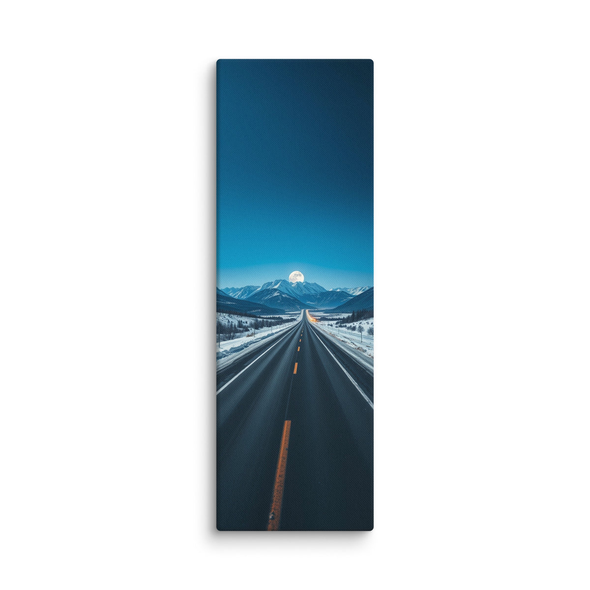 Moon At The Ridgeline, tall wrapped canvas print: a full moon rising over a snow-capped ridgeline at the end of a long straight winter road.