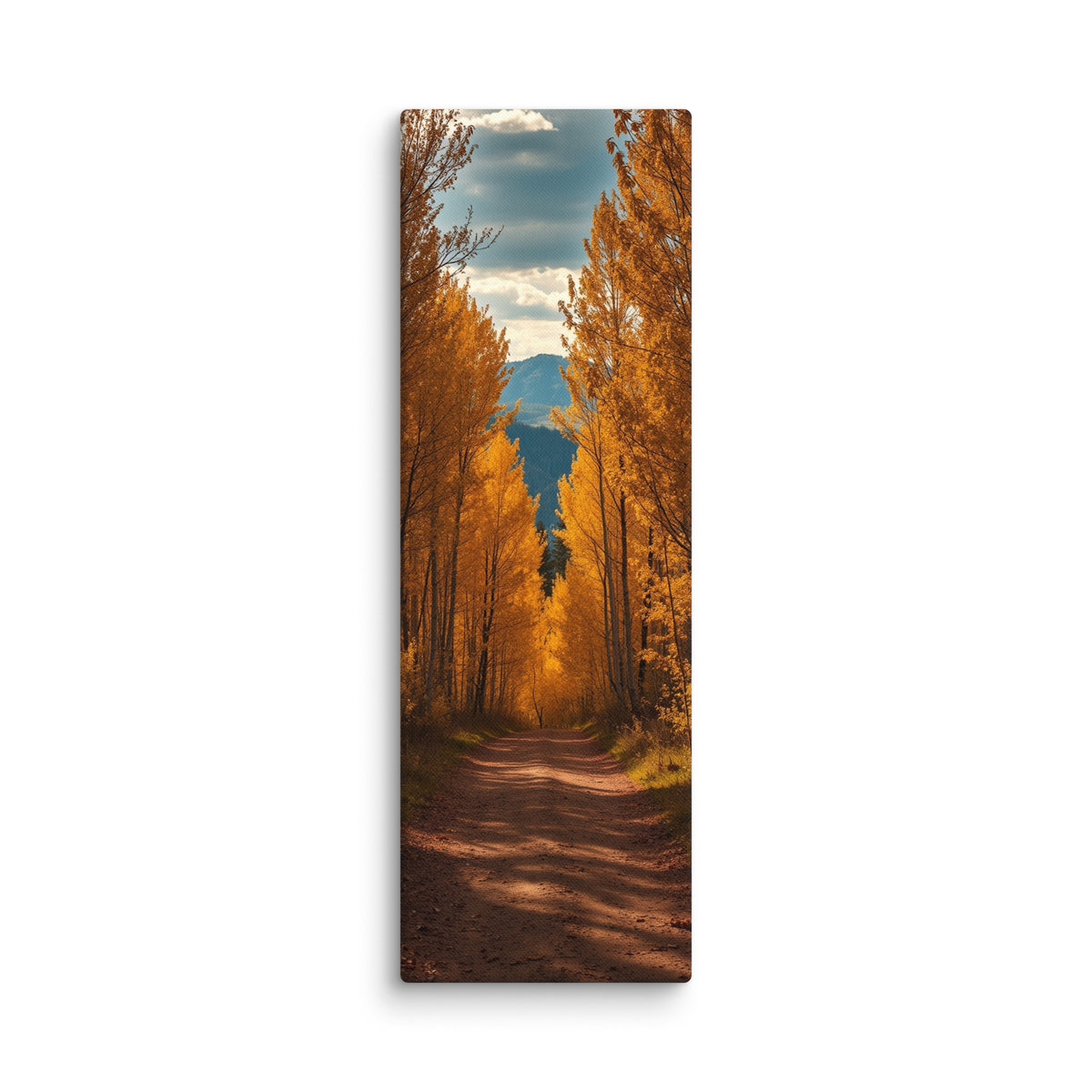 A Canopy Of October, tall wrapped canvas print: a dirt path through a tunnel of golden autumn trees toward distant mountains.