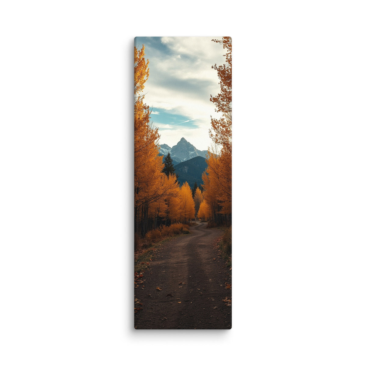 The Peak Beyond The Trees, tall wrapped canvas print: a dirt road through golden autumn trees toward a distant rocky peak.