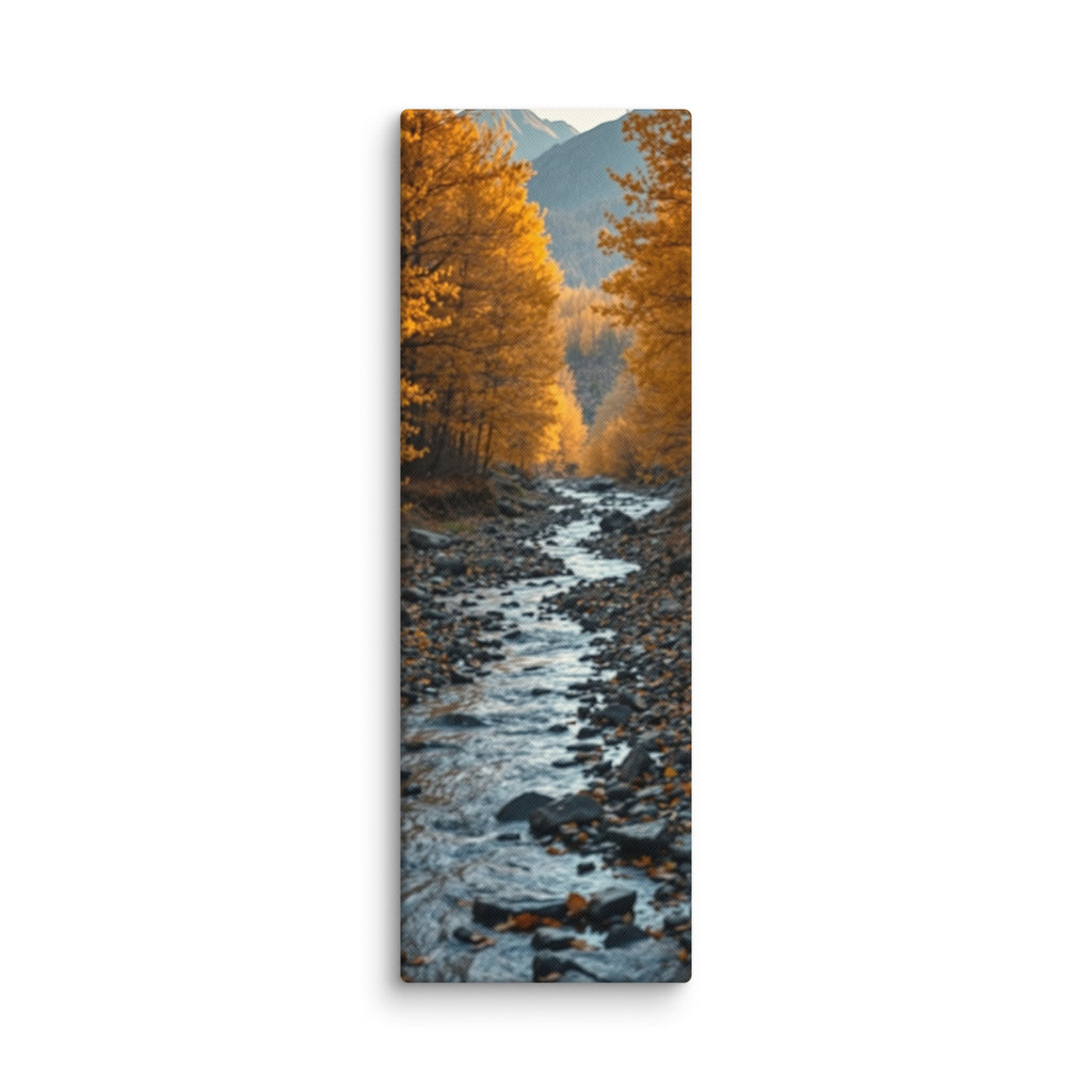 Silver Under Amber, tall wrapped canvas print: a silvery stream flowing between golden autumn trees over dark pebbles.
