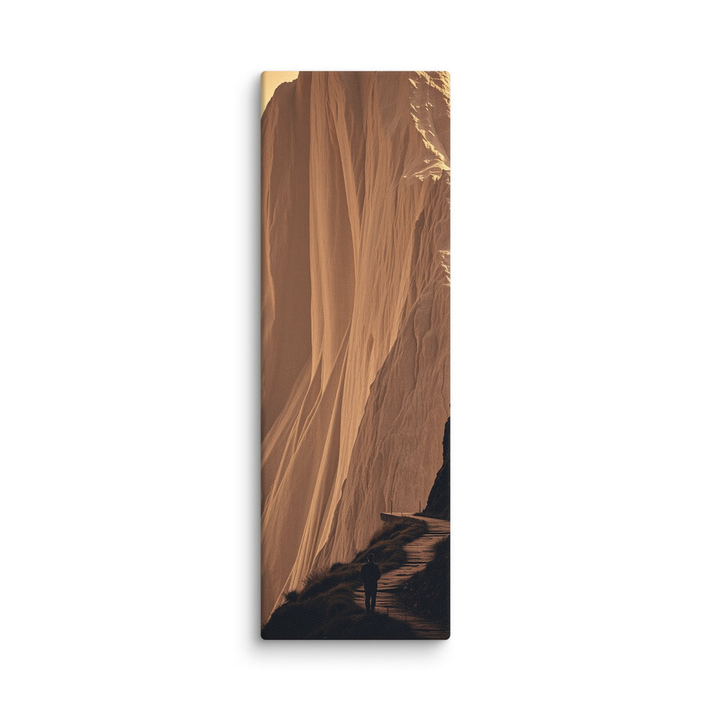 The Molten Falls, tall wrapped canvas print: a vast golden cliff face flowing like molten rock with a lone figure on the path below.