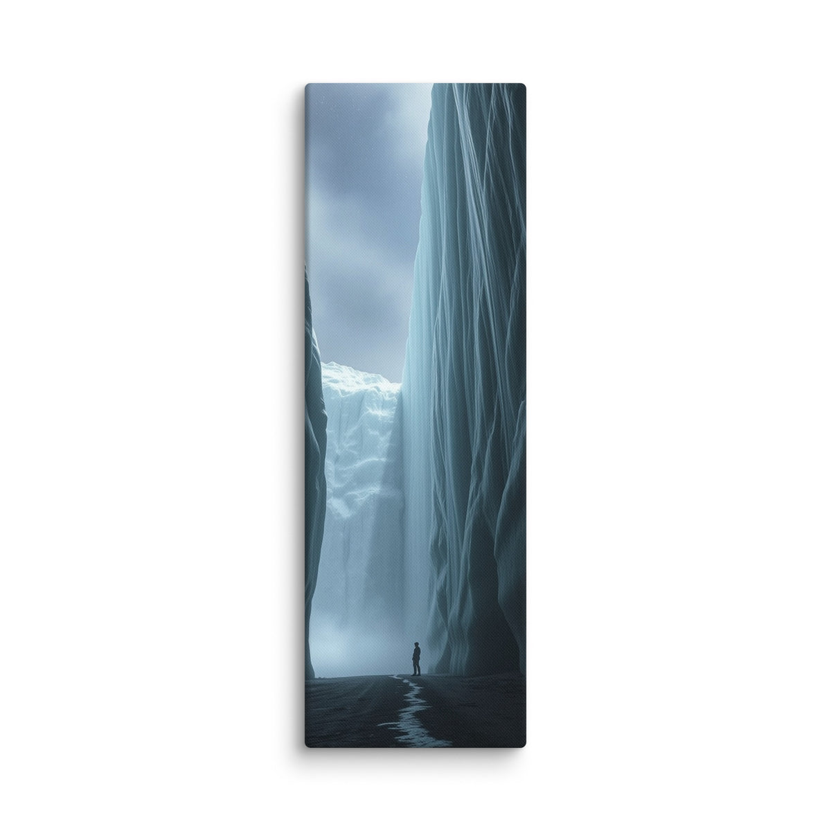 A Thread Of Water, tall wrapped canvas print: a lone figure between colossal ice walls with a thin thread of meltwater winding toward the viewer.