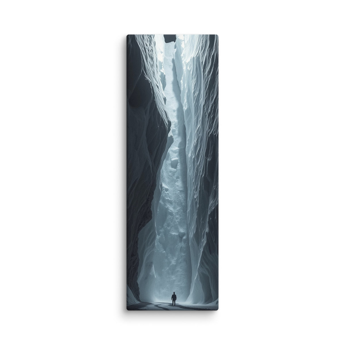Between The Fractures, tall wrapped canvas print: a lone figure on a winding path between fractured ice walls with light above.