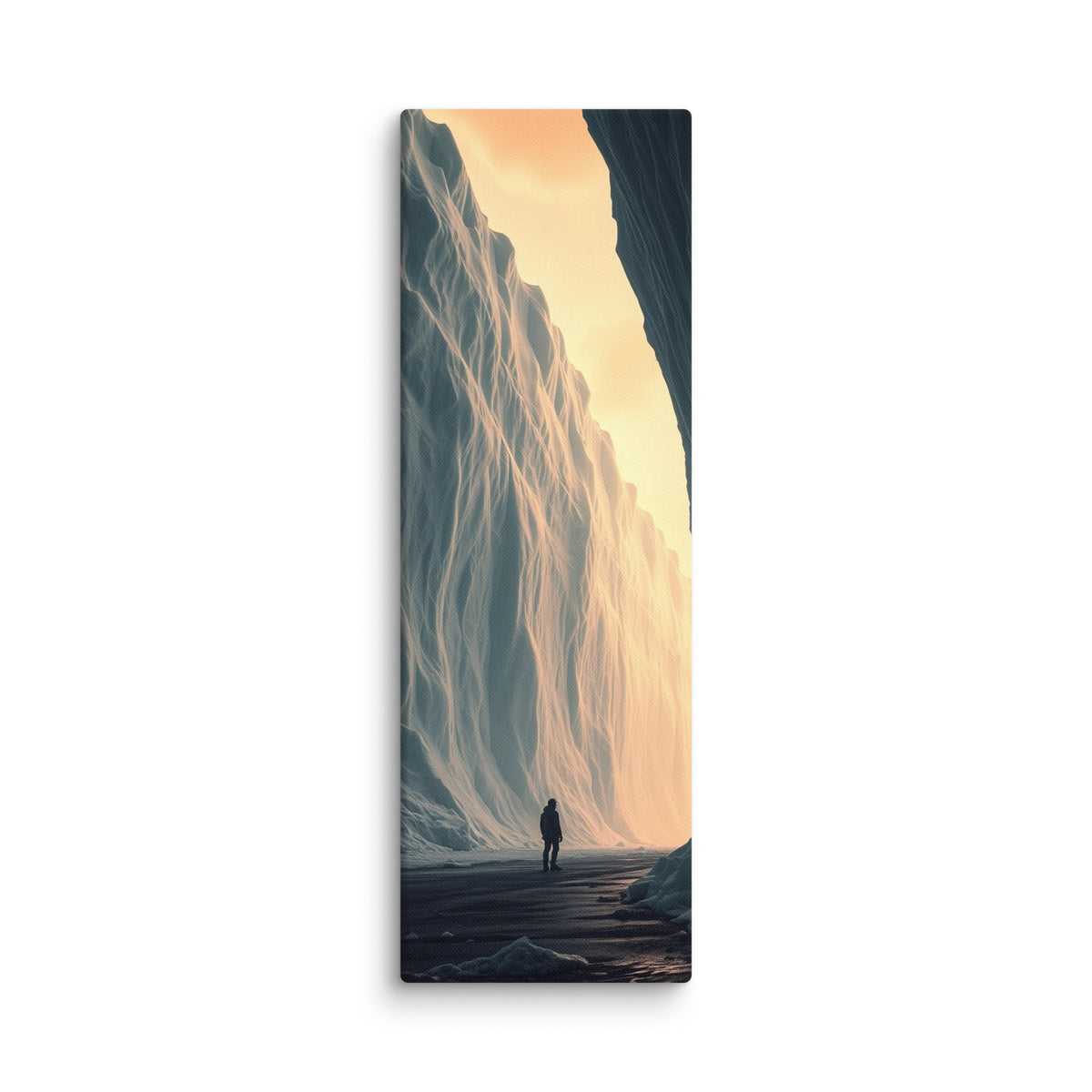 The Amber Wall, tall wrapped canvas print: a lone figure on a dark shore beneath a towering ice wall glowing amber.
