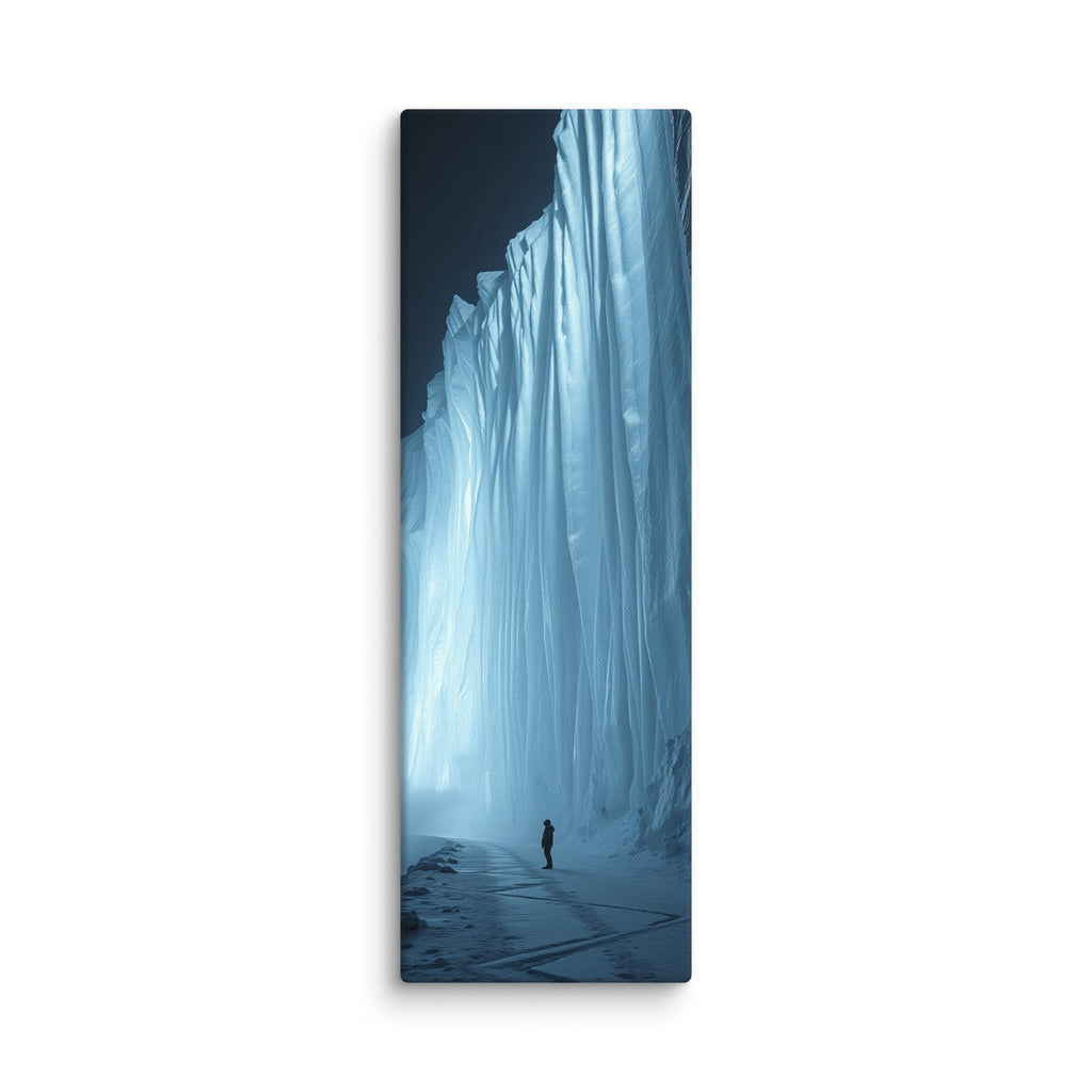 The Blue Monolith, tall wrapped canvas print: a lone figure beside a massive glowing blue-white icefall wall at night.