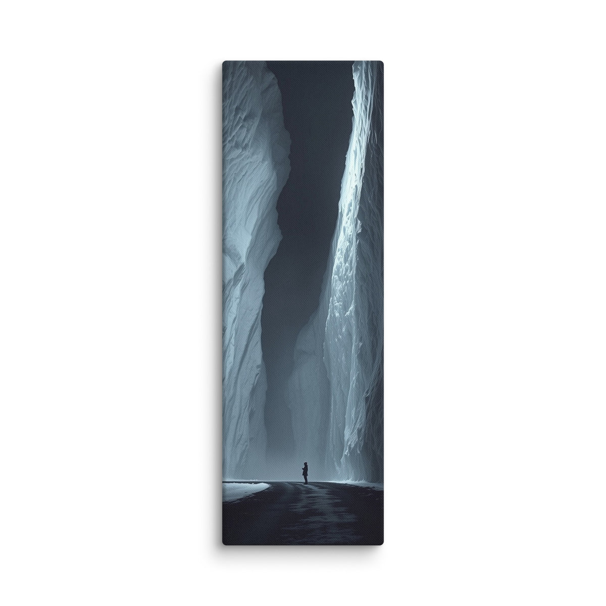 The Dark Reach, tall wrapped canvas print: a lone figure on dark ice between towering ice walls with light falling down one face.