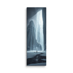 The Shining Fall, tall wrapped canvas print: a glowing frozen waterfall pouring light between dark ice cliffs above a lone figure.