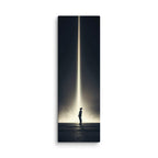 The Descending Light, tall wrapped canvas print: a lone figure looking up at a single vertical beam of golden light in darkness.