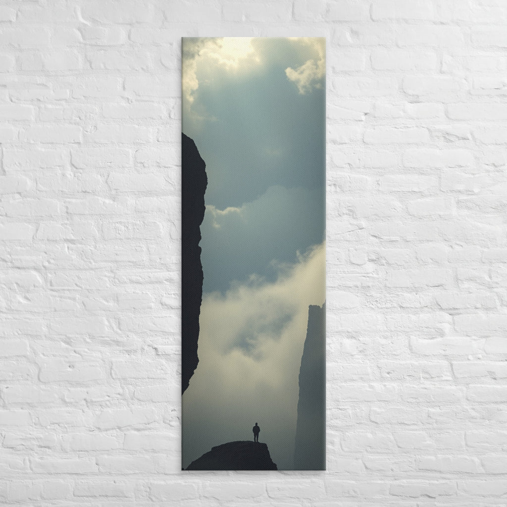 Between the Dark Walls, tall wrapped canvas print: a solitary figure on a rock fin between two sheer dark cliff walls, mist in the gorge.