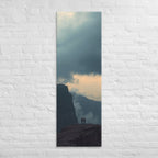 The Evening Overlook, tall wrapped canvas print: two figures on a clifftop at dusk, warm light glowing along the horizon beneath clouds.