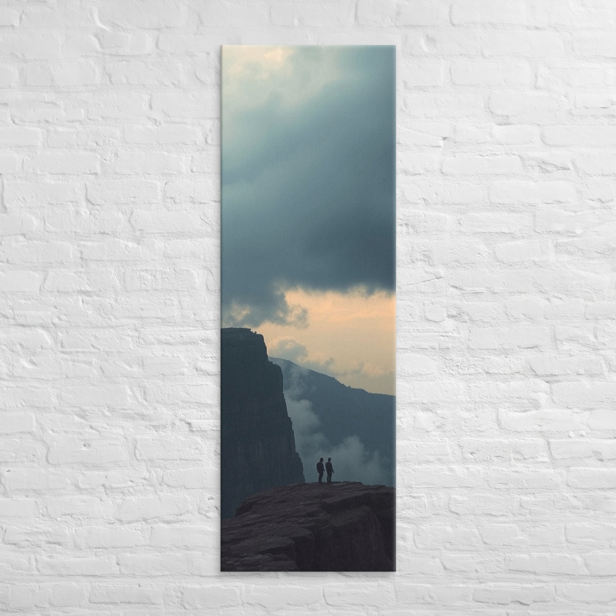 The Evening Overlook, tall wrapped canvas print: two figures on a clifftop at dusk, warm light glowing along the horizon beneath clouds.