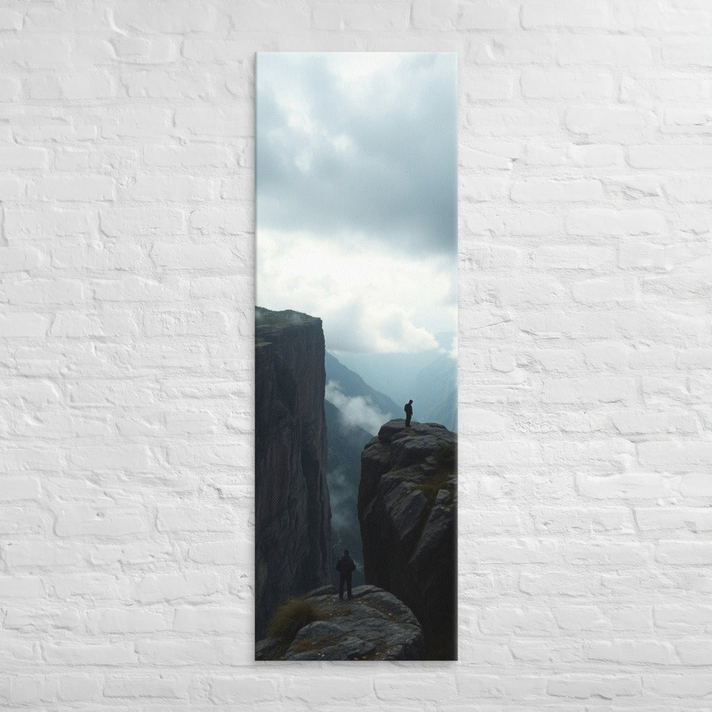 Across the Divide, tall wrapped canvas print: two figures on separate rocky outcrops with a misty mountain divide between them.