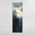 The High Promontory, tall wrapped canvas print: a lone figure at the tip of a dark rocky promontory jutting into clouds.