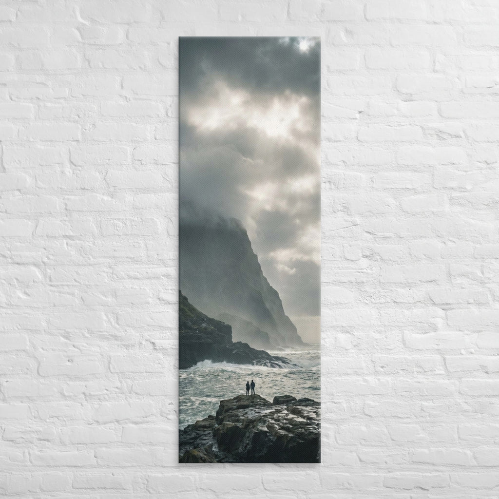 Where the Cliffs Meet the Sea, tall wrapped canvas print: two figures on wave-washed rocks where tall cliffs meet a churning sea.