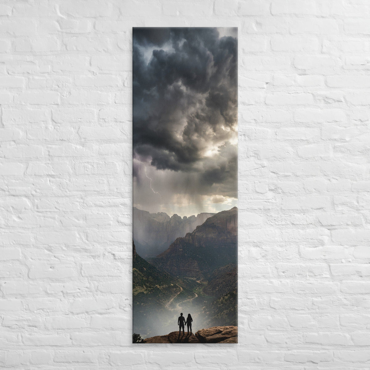 The Storm Above the Valley, tall wrapped canvas print: two figures on a cliff rim watching rain shafts fall over a valley under storm.