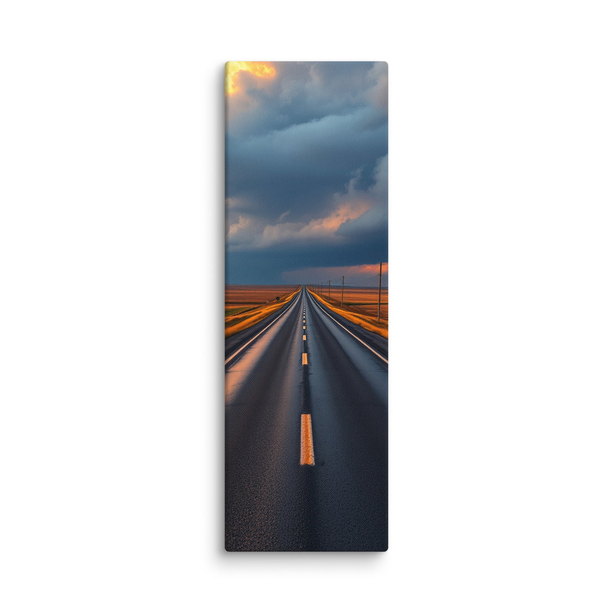 The Evening Miles, tall wrapped canvas print: a road across golden plains into a blazing sunset of towering gold and rose clouds.