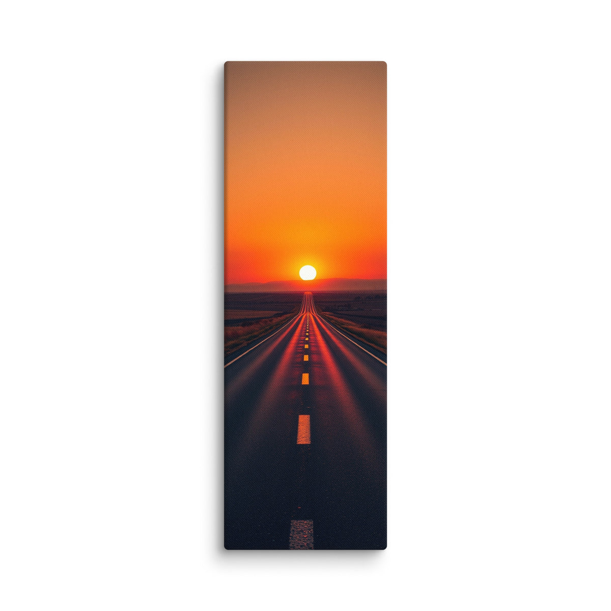 The Horizon Burns, tall wrapped canvas print: a road running straight into a blazing orange-red sunset, red light flooding the asphalt.