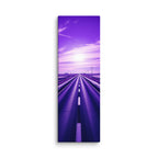 The Violet Hour, tall wrapped canvas print: a road through winter-white plains beneath a vivid violet sky, a bright sun glowing at its center.