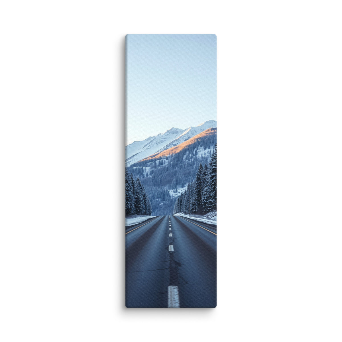 The Last Warm Ridge, tall wrapped canvas print: a road between snowy pines toward a snow peak catching the last warm alpenglow.
